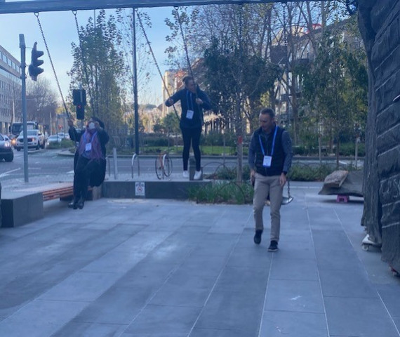 Conference attendees playing on the play equipment